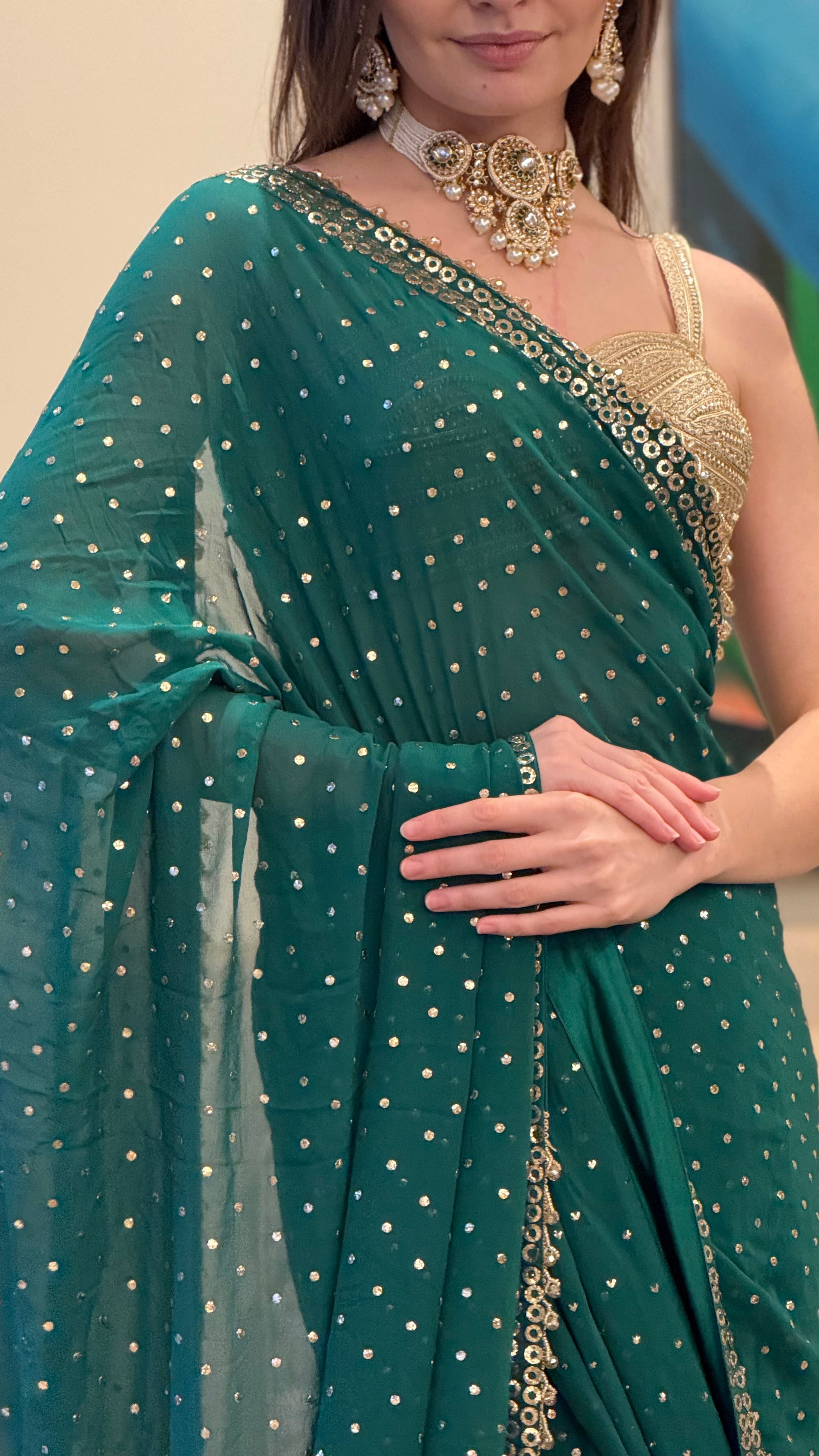 Emerald Green Georgette Mauvish Saree with Heavy Golden Pitta